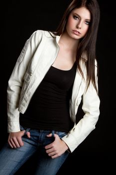 Teenage girl wearing leather jacket