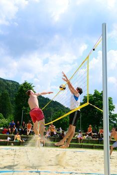 ZELL AM SEE, AUSTRIA - JUNE 26: Participants at the Beach City 2010, the biggest amateur Beach Volleyball Tournament in Austria. June 26, 2010 in Zell am See, Austria