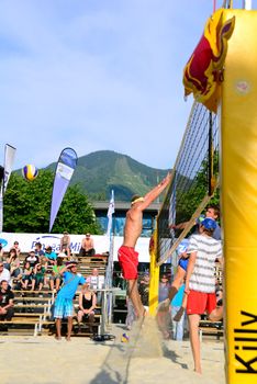ZELL AM SEE, AUSTRIA - JUNE 26: Participants at the Beach City 2010, the biggest amateur Beach Volleyball Tournament in Austria. June 26, 2010 in Zell am See, Austria