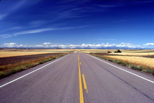 Empty road in Montana in time of harvest