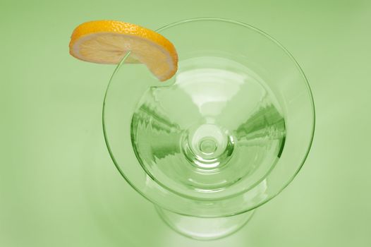 white cocktail with lemon