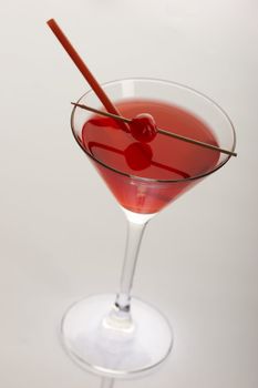 red cocktail and cherry