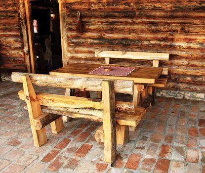 rustic wooden benches and table in rural Serbia