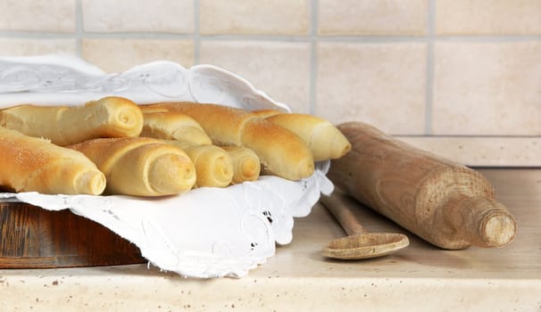 appetizing homemade bread rolled loafs in kitchen