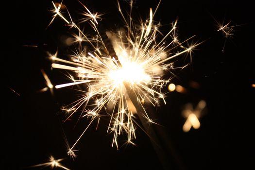 burning sparkler on New Years Eve