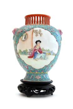 Vintage hand painted chinese vase isolated on white background.