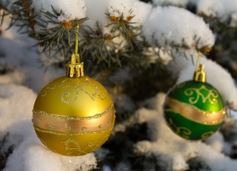 christmas decorations on fir branch outdoors