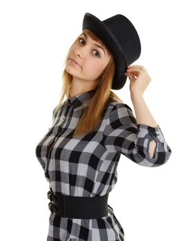 A beautiful young woman in a black hat posing on a white background