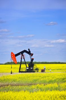 Oil pumpjack or nodding horse pumping unit in Saskatchewan prairies, Canada