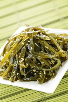 Plate of seaweed and sesame seed salad