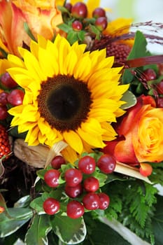 Bouquet of flowers with big yellow sunflower,roses  and copyspace