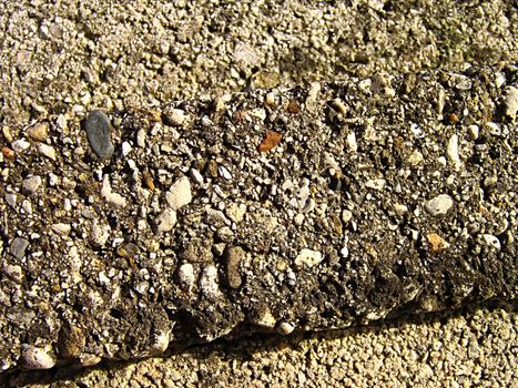 A photograph of stones detailing their texture.