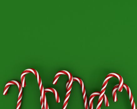 A lot of christmas candies on green background