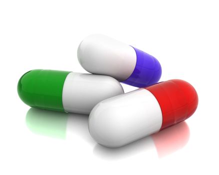 Few pills isolated on white background