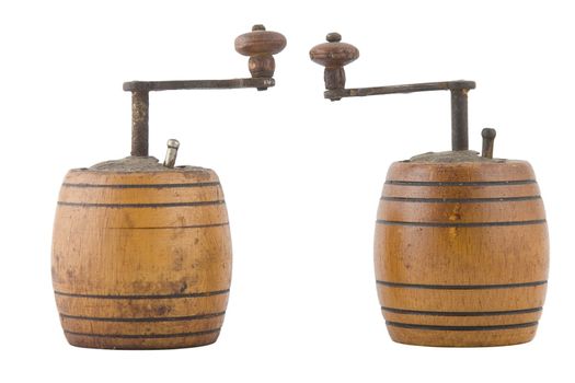 two vintage brown grinder, wooden made, on white background