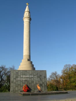 Monument; eternal flame; laid; architectral building; styles; park