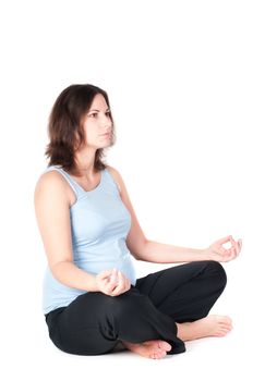 Portrait of pretty pregnant woman practicing physical exercise isolated on white