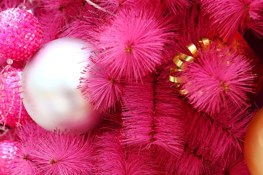pink christmas background with many balls