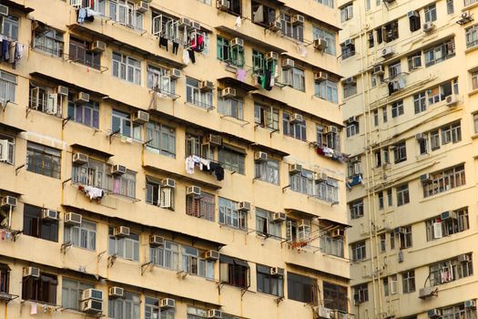 Old apartments in Hong Kong close up at day