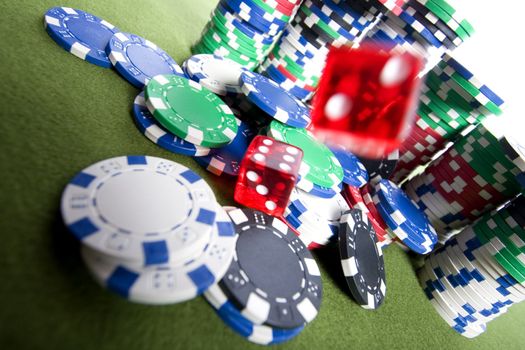 Red casino dice and gambling chips