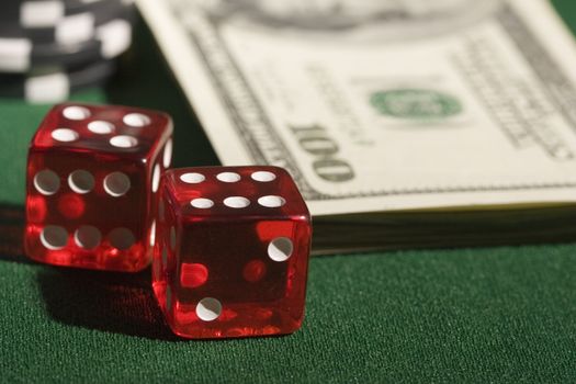 Red casino dice and gambling chips