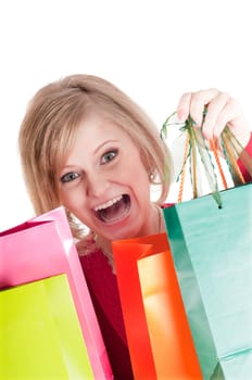 Beautiful woman with shopping bags isolated onwhite