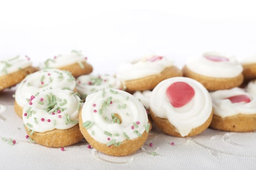 Festive cookies with frosting and decorations.