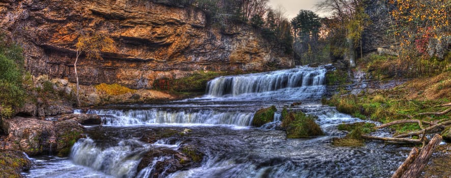 Colorful scenic waterfall produces in HDR.