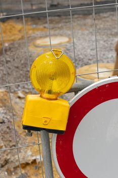 Safety lamp at a road construction site