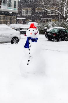 Snow in the city - Snowman in snowstorm