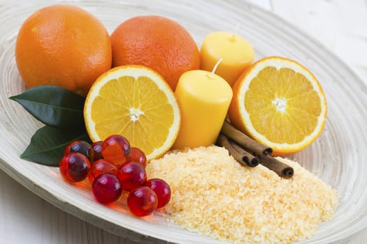 orange bath salt with fresh fruits - beauty treatment