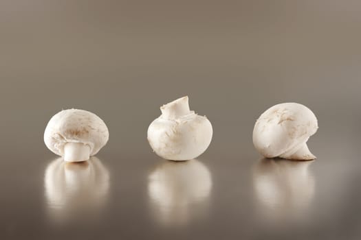 An image of three mushroom in a row