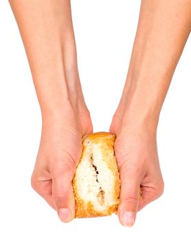 Hands breaking a bun, isolated on the white background