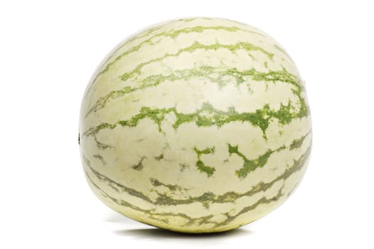 Close up view of a light green watermelon isolated on a white background.