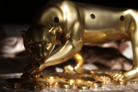 Luxury Golden Jaguar Figurine close up.