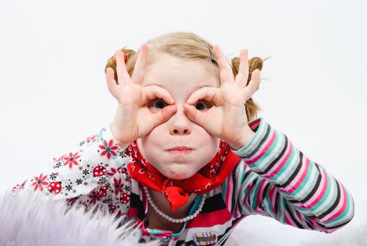 studio shot of pretty little girl looks like a diver