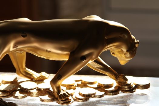 Luxury Golden Jaguar Figurine close up.