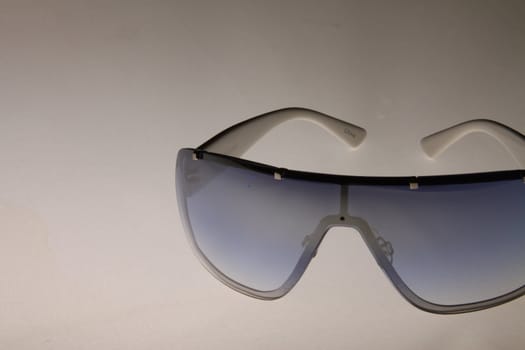 Close up of sunglasses on a white background.