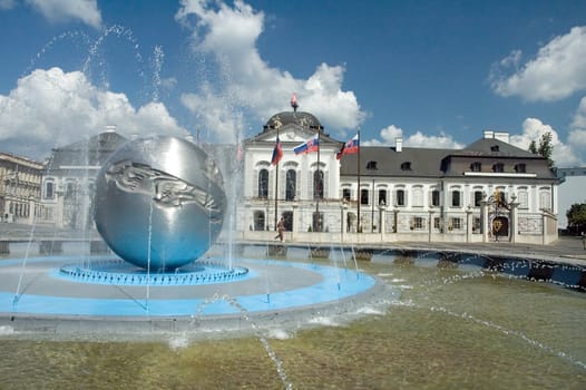Grassalkovichov palace. fountain in foreground, nice sunny day