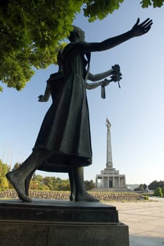 young woman sculpture in front of  Slav�n in Bratislava, it is a memorial monument and cemetery for Soviet Army soldiers who fell during World War II while liberating the city of Bratislava in April 1945 from Nazi German troops. 