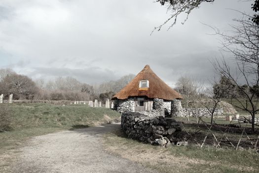 historic ancient rustic cottage dwelling in rural setting in ireland