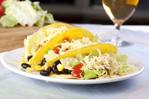 Homemade vegetarian tacos with black beans and sweet corn.