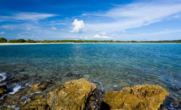 Circular sandy bay off the south west coast of Puerto Rico by Los Morillos Lighthouse