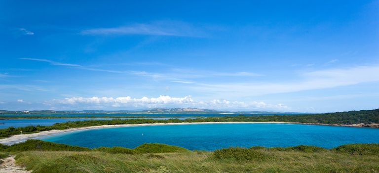 Circular sandy bay off the south west coast of Puerto Rico by Los Morillos Lighthouse