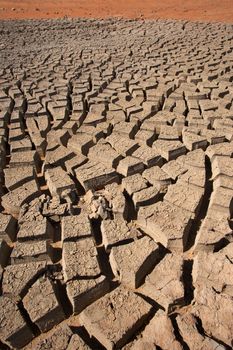 Cracked mud in the desert near Al Ain, in the emirate of Abu Dhabi, United Arab Emirates.