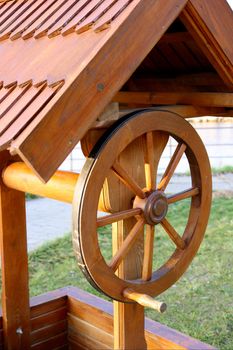 Traditional wooden well structure in a rural area