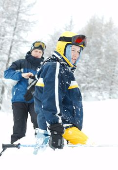 Skiers waiting in the deep snow