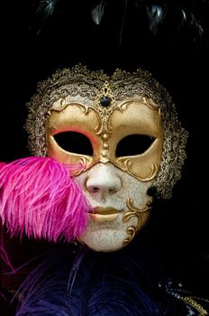 Gold traditional venetian carnival mask. Venice, Italy.