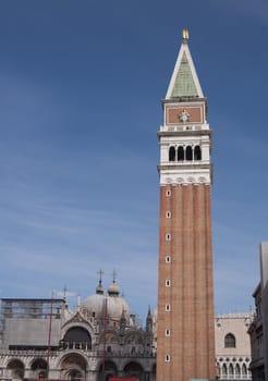 St Mark's Campanile over blue sky in Venice, Italy
