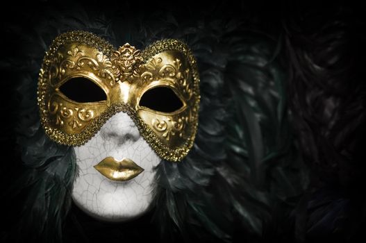 Gold traditional venetian carnival mask. Venice, Italy.